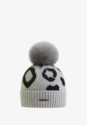 Gray knitted beanie with black abstract patterns, featuring a fluffy gray pom-pom on top and a ribbed cuff with a small logo plate.