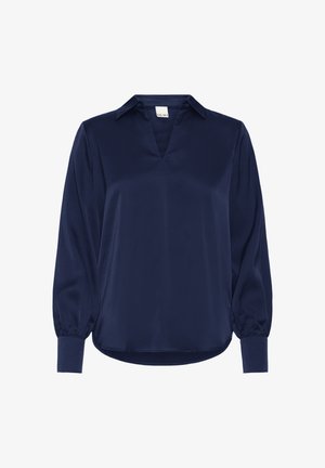 Blusa in raso blu navy con scollatura a V, maniche lunghe a sbuffo e polsini con bottoni. Texture liscia, vestibilità leggermente ampia e orlo curvo nella parte inferiore.