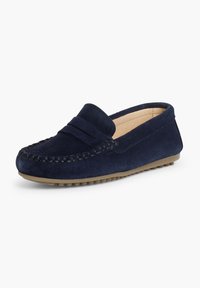 Mocassin en suède bleu marine avec couture mocassin, bout arrondi et semelle en caoutchouc beige avec crampons antidérapants.