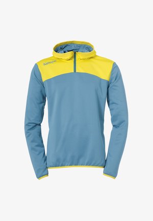 Pull-over en polaire bleu clair avec une section supérieure jaune et un col zippé. Caractéristique de manches longues et d'un ourlet ajusté. Logo sur la poitrine.