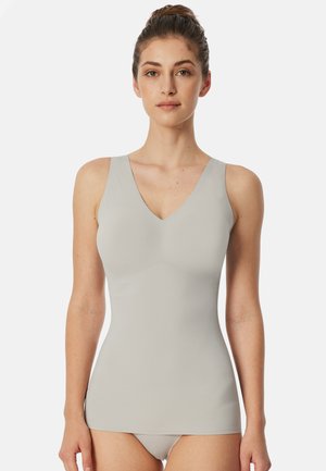 Light gray V-neck tank top made of smooth, stretchy fabric with wide straps, designed for a fitted silhouette, reaching the hips.