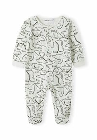 Bela dolga majica z dolgimi rokavi, ki ima dinozaurov motiv v črni in zeleni barvi. Oblikovanja vključujejo različne dinozavre in besedilne elemente, kot sta "ROAR" in "CUTE."