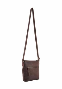 Sac en cuir croisé de couleur marron foncé, doté d'une poche zippée à l'avant, d'une bandoulière réglable et d'une texture lisse avec des détails de couture subtils.
