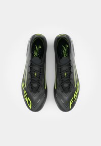 adidas Performance F50 ELITE FG - Chaussures de football pour terrain sec - core black/iron metallic/lucid lemon