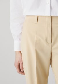HUGO HULANA - Hlače - open beige