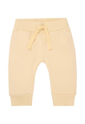 Helle gelbe Baumwoll-Jogginghosen mit gerippten Bündchen und elastischem Bund, ausgestattet mit einem Kordelzug und einer glatten Textur.