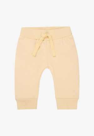 Lichtgele katoen joggers met ribbelboorden en elastische tailleband, met een trekkoordsluiting en een gladde textuur.
