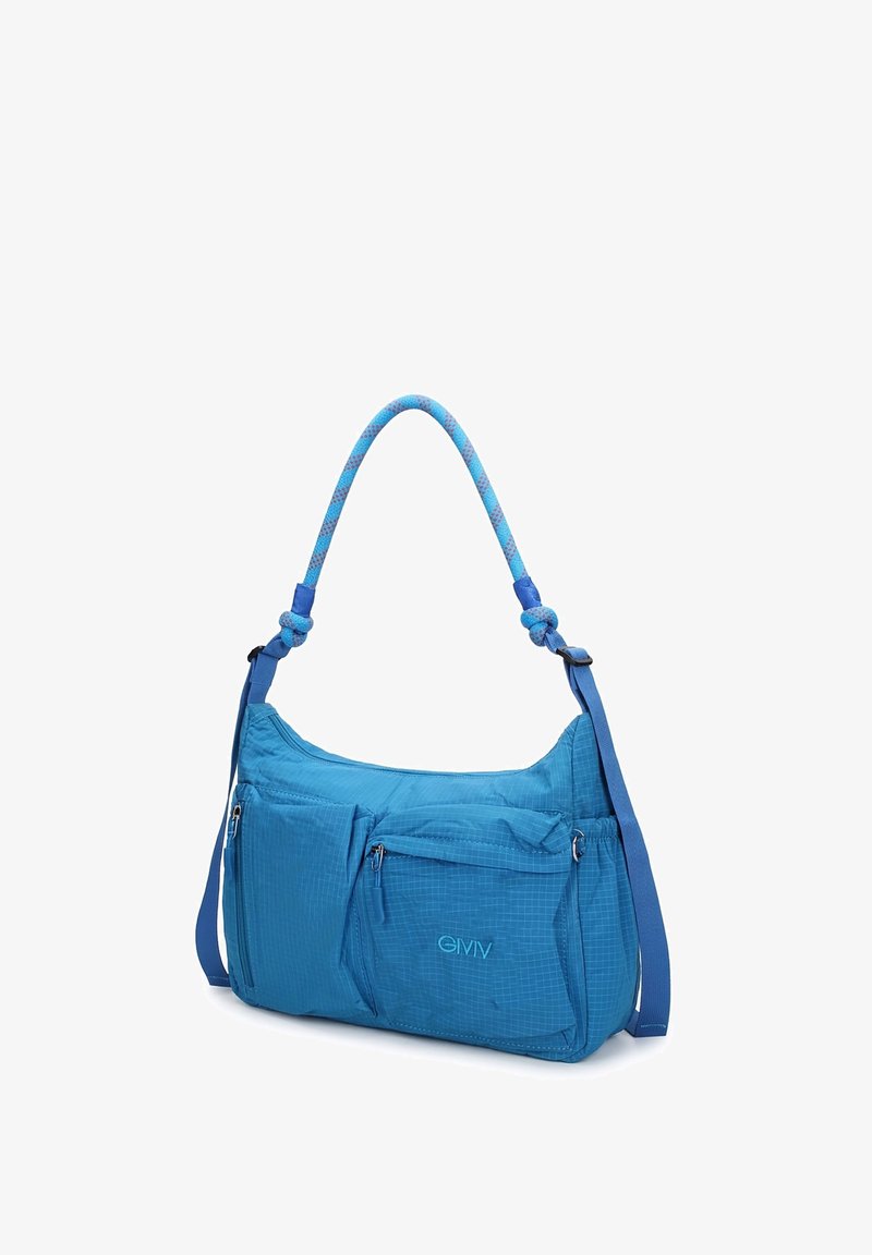 Sac à épaule bleu avec plusieurs poches zippées, une anse tressée et une sangle réglable, conçu pour un usage décontracté.