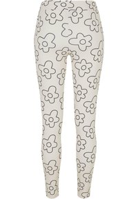 Hvite leggings med svart blomsterdesign, med tegnet blomster. Glatt tekstur med en tettsittende design og mid-rise midje. 