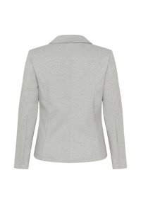 Blazer structuré gris avec un col cranté, des manches longues et un dos ajusté. Fabriqué en tissu lisse, avec des lignes épurées et un minimum de détails.