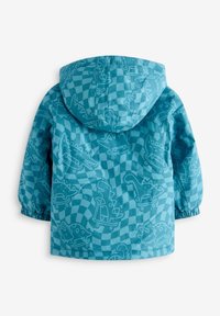 Giacca turchese resistente all'acqua con motivi di dinosauri, polsini elastici e cappuccio. Il design presenta uno sfondo a quadri.
