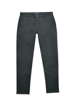 Pantalons noirs en tissu doux, coupe ajustée, avec une fermeture à bouton, des passants de ceinture et des poches avant avec des détails de couture subtils.