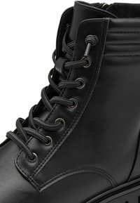 Marco Tozzi Bottines compensées - black