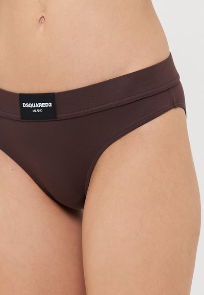 Brune bikini-bukser fra DSQUARED2 med en bred talje med et sort mærke. Materialet virker glat med en tætsiddende pasform.