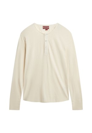 Lange mouw, henley-stijl shirt in crèmekleurige stof met een zachte textuur, met een drieknoopssluiting en een gebogen zoom.