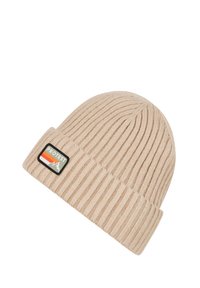 Light beige knitted beanie with ribbed texture, featuring a black patch with "PROTEST" text and a mountain graphic in orange and green.