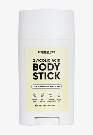 Glykolsyre kropsstift med duft af citronverbena og mynte, indeholdende sheasmør, natriumhyaluronat og jojobaolie, beholder på 75 g.