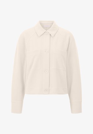 Jasna kremowa kurtka z kołnierzykiem, wykonana z gładkiego materiału. Posiada dwie przednie kieszenie i zapięcie na guziki, z mankietami i krojem w stylu cropped.