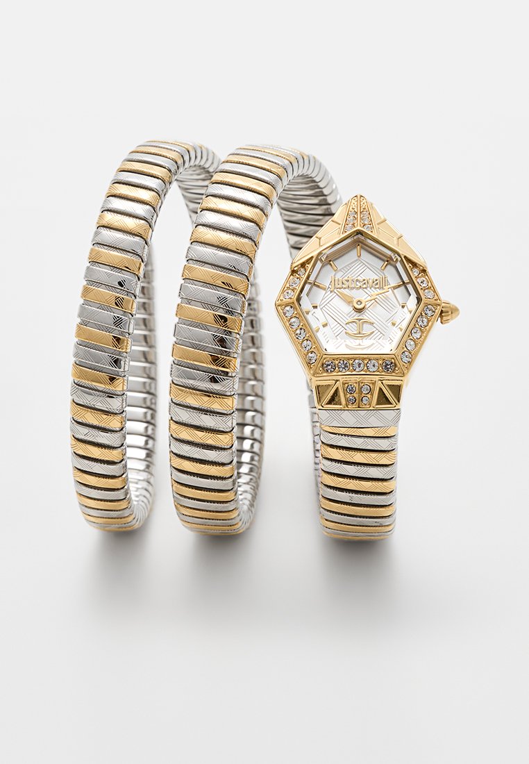 Orologio bangle in metallo testurizzato oro e argento con quadrante esagonale, accentuato da pietre chiare e un design del bracciale a motivi.