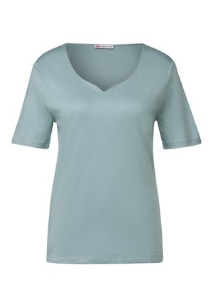 T-shirt azzurro chiaro a maniche corte con scollo a V. Realizzato in morbido tessuto jersey con una consistenza liscia. Design semplice, senza motivi o dettagli visibili.