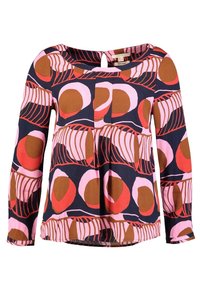 Haut à manches longues bleu marine avec de grands motifs circulaires rose, marron et corail. Comprend un col rond et un léger froncé à la taille.