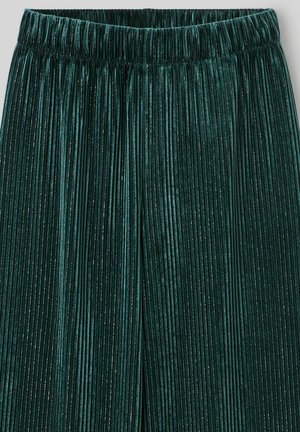 Pantalon en velours bleu sarcelle avec des plis verticaux et une ceinture élastique, présentant une texture douce avec des étincelles subtiles sur toute la surface.