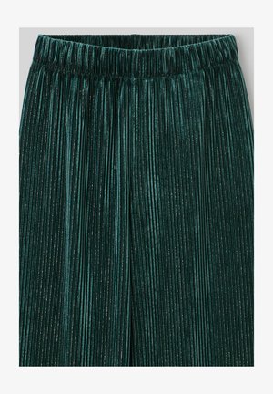 Pantalon en velours bleu sarcelle avec des plis verticaux et une ceinture élastique, présentant une texture douce avec des étincelles subtiles sur toute la surface.