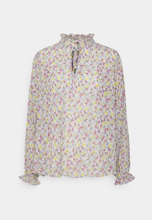 Blouse légère et florale avec un col froncé et des manches longues. Présente des fleurs jaunes, roses et violettes sur un fond pâle.