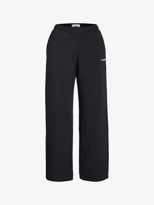 Svart sweatpants med elastisk midje, med en avslappet passform og en liten hvit logo på venstre ben. Laget av myk stoff.