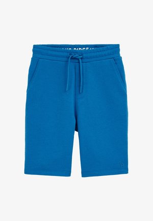 Sinised puuvillased lühikesed püksid elastse vöökoha ja paelaga. Omavad kahte küljetaskut ning logo detaili alumises paremas sääres.