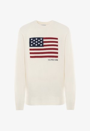 Maglione color crema con un prominente design della bandiera americana in rosso e blu, con stelle bianche, esposto nella parte anteriore sopra il testo "U.S. POLO ASSN.".