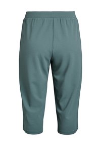 Türkise knielange Hose mit elastischem Bund, glatter Textur und ohne sichtbare Taschen oder Muster. Schlichtes und lässiges Design.
