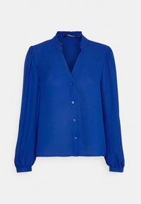 Blusa blu con maniche lunghe e colletto a balze. Presenta una chiusura frontale con bottoni e un tessuto liscio e fluido con una leggera lucentezza.