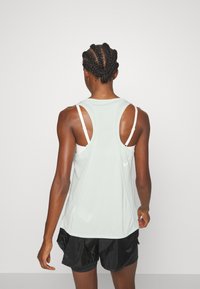 Nike Performance FAST TANK - Top - barely green/silver