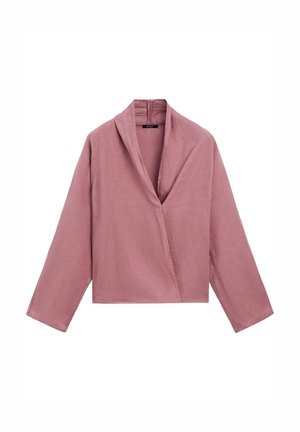 Blouse longue à manches longues couleur rose poudré avec un col en V profond et une coupe décontractée, fabriquée en tissu léger.