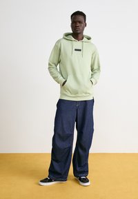 Ellesse VARI - Mikina s kapucňou - green