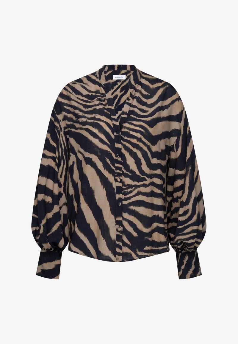 Blouse boutonnée à manches longues avec des rayures zèbre noires et beiges, manches bouffantes et col en V.
