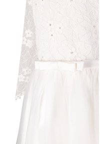 Bíl�é šaty s krajkovým korzetem zdobeným květinovými vzory a flitry, a tylovou sukní s páskem z saténu na mašličku.