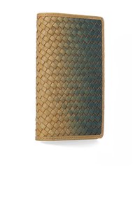 Woven wallet in tan and teal gradient, featuring a textured surface, smooth edges, and sturdy stitching along the borders.
