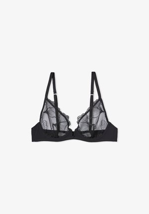 Soutien-gorge noir avec des bonnets en dentelle transparente brodée présentant des motifs floraux, des bretelles réglables et des bords festonnés. Bande sous la poitrine douce pour plus de confort.