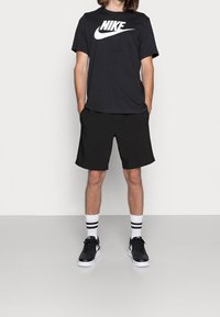 Nike Sportswear T-shirt med print - black