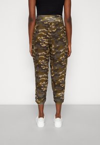 Cream Pantaloni - khaki
