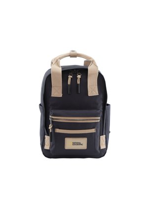 Navy backpack with beige straps and accents. Features a front zip pocket, logo patch, and textured fabric. Compact design and sturdy construction.