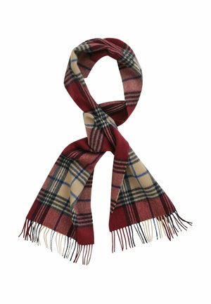 Écharpe à carreaux rouge, beige et bleu avec des extrémités à franges, pliée en boucle sur un fond blanc.