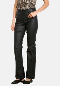 COATED  - Jeans Bootcut - black