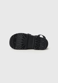 UGG GOLDENRISE - Sandali con plateau - black