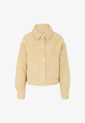 Gelbe strukturierte Jacke mit Kragen, Frontknopfverschluss und zwei aufgesetzten Taschen. Gerippte Bündchen und ein verkürzter Schnitt.