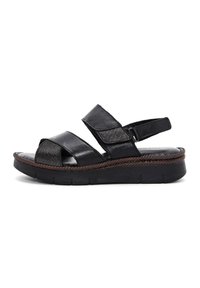 Black leather sandals with two wide straps and an adjustable heel strap. Features a textured insole and a low, cushioned platform sole.