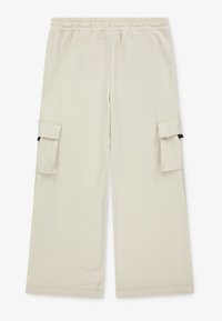 Beige cargo pants with an elastic waistband, two side pockets, wide-leg design, and soft, smooth fabric texture.
