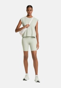 OYSHO SLEEVELESS SEAMLESS - Basic póló - green